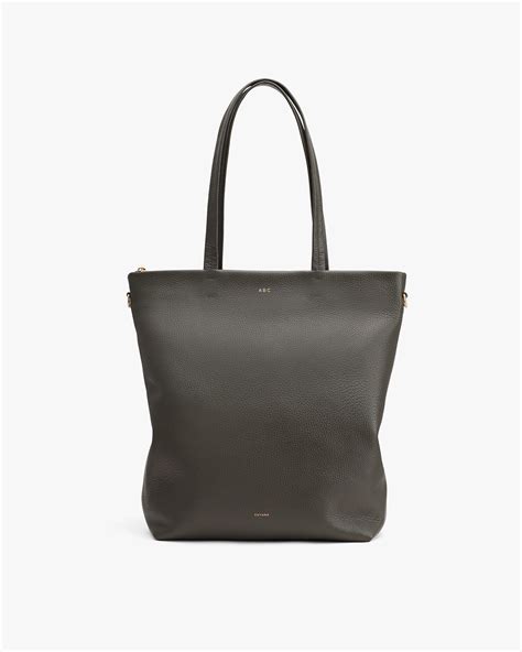 cuyana tall easy zipper tote.